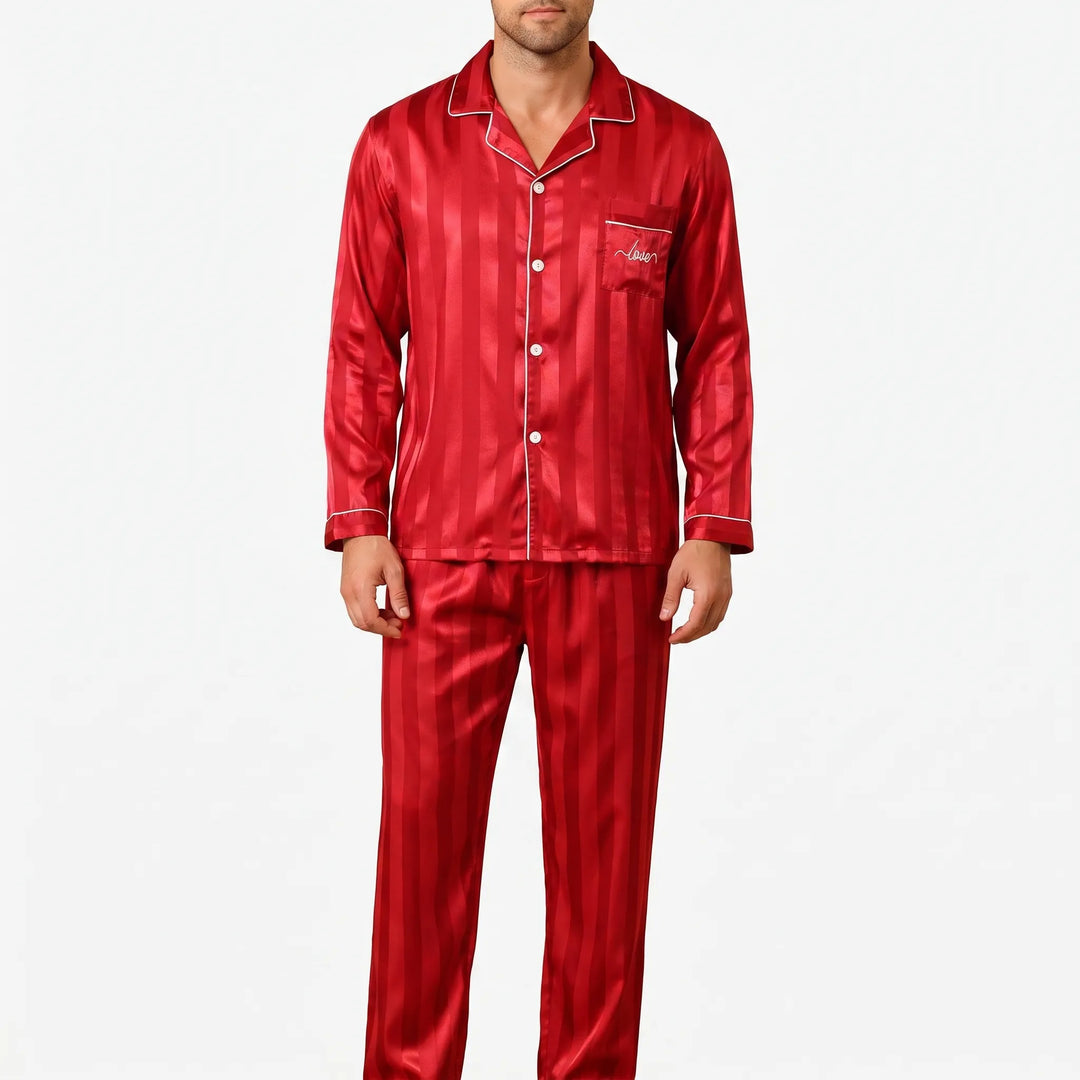 Model wearing the same striped satin pajama set in red with white piping, front view against a plain background. 6