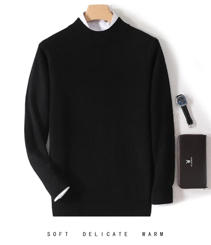 Black mock neck sweater on a hanger over a white shirt, with a watch and wallet 15