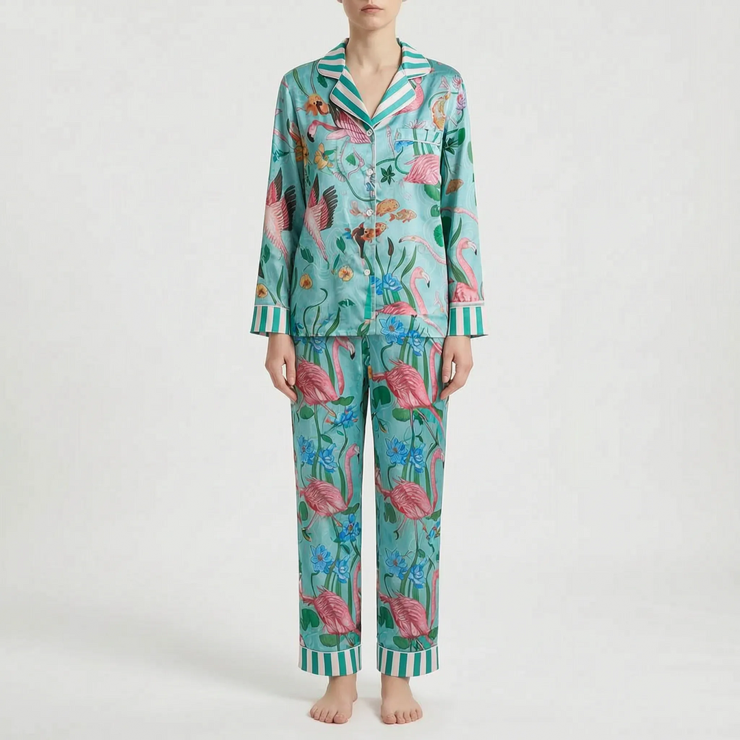 Pajama set in a different print: turquoise with pink flamingos, blue flowers and green-striped collar, cuffs and pant hems. 9
