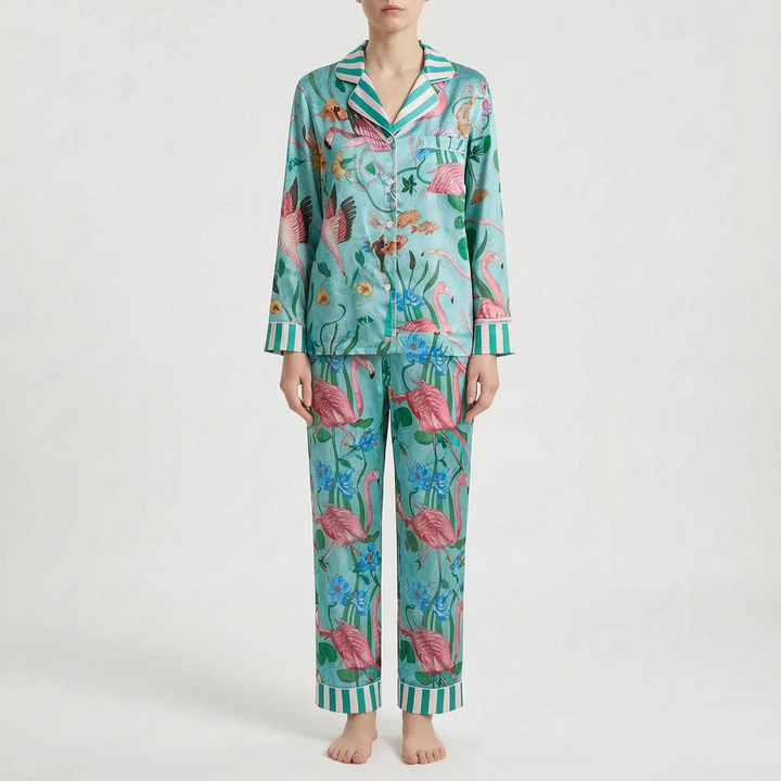 Pajama set in a different print: turquoise with pink flamingos, blue flowers and green-striped collar, cuffs and pant hems. 9