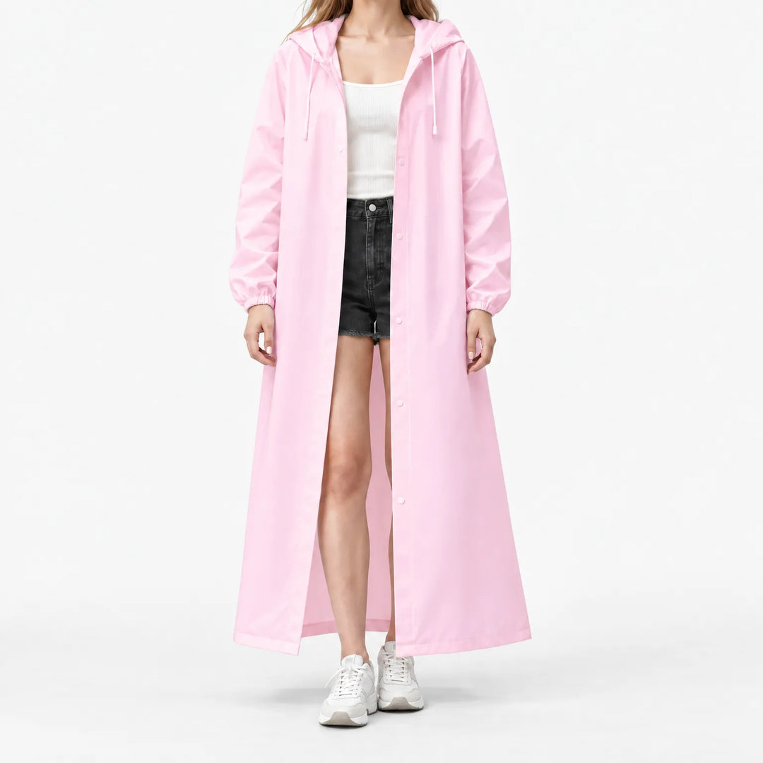Studio front view of a model in the pink hooded coat, open over a ribbed tank, with elastic cuffs visible. 7