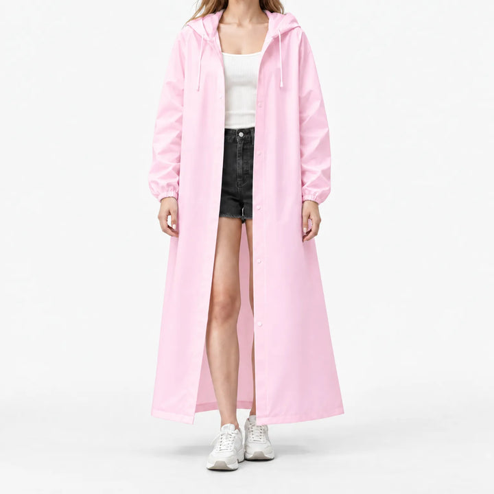 Studio front view of a model in the pink hooded coat, open over a ribbed tank, with elastic cuffs visible. 7