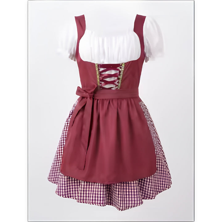 Burgundy dirndl with white puff-sleeve blouse, lace-up bodice, bow-tied apron and checkered skirt, shown front on a 1