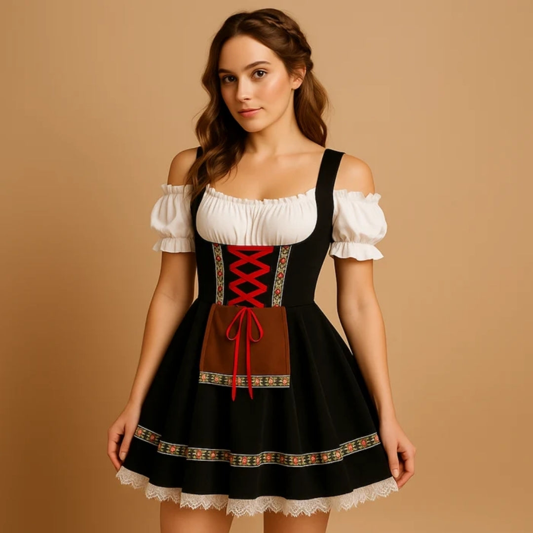 Woman in a black off-shoulder dirndl with red criss-cross lacing, brown apron and lace-trimmed skirt 7
