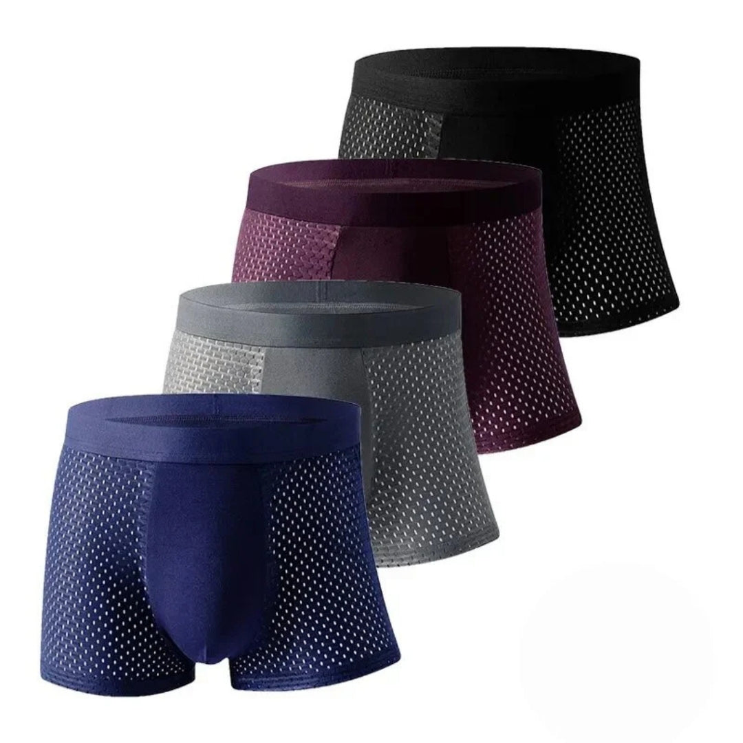 Four boxer briefs in black, burgundy, gray and navy arranged diagonally, each with perforated mesh side panels and a smooth center. 10