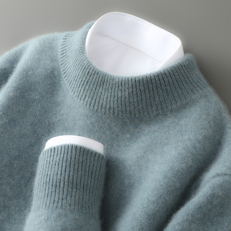 Cashmere sweater in soft sage-blue with a ribbed mock neck, another view.