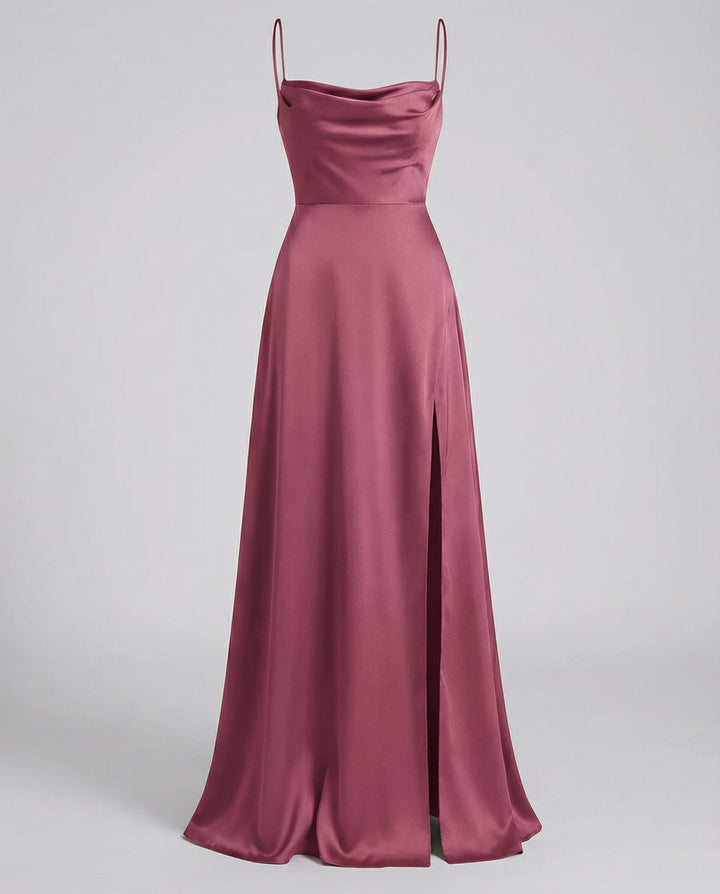Dusty rose satin maxi dress shown flat, showing the cowl neckline, thin straps, A-line skirt and side slit.