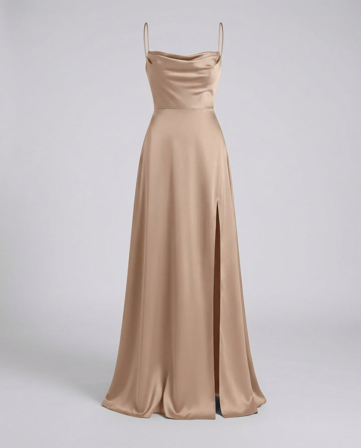 Champagne beige satin maxi dress shown flat, with draped cowl neck, thin straps and a flowing skirt with slit.