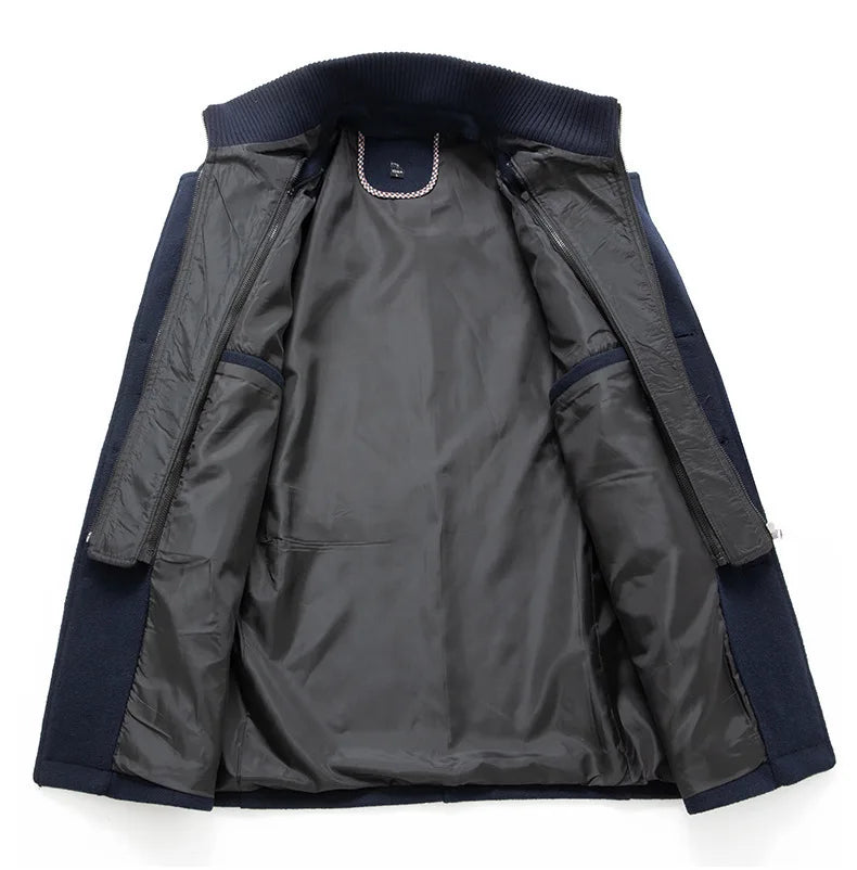 Inside of the navy overcoat laid open, showing the dark quilted lining and detachable zip-in collar layer 7