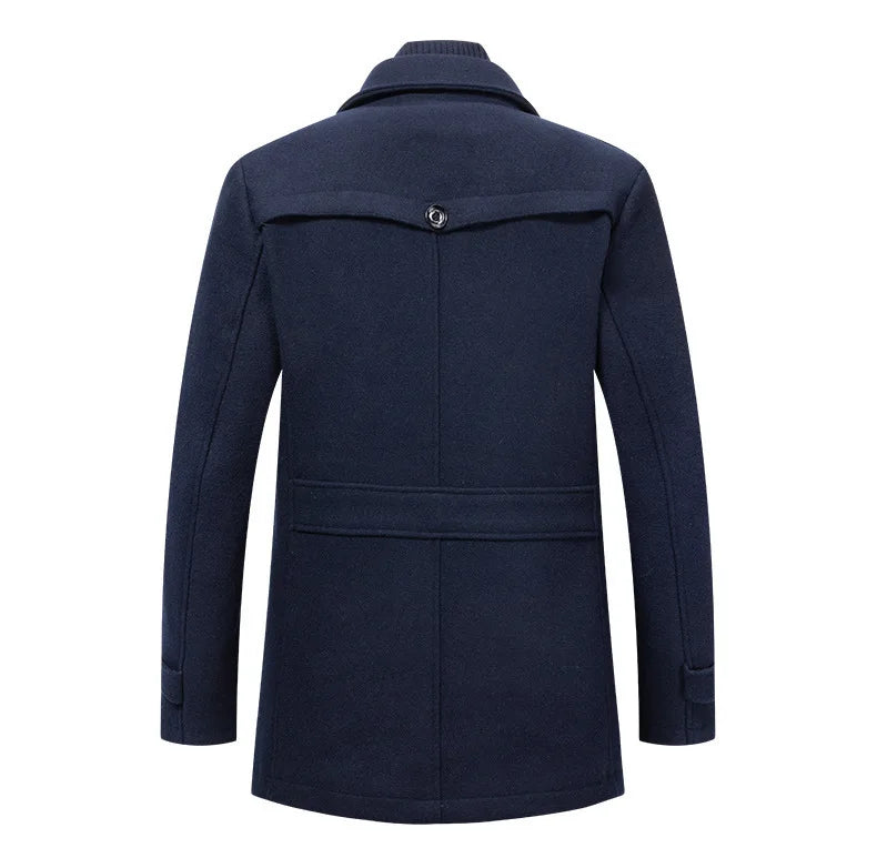 Back view of the navy overcoat showing the back yoke with button and waist strap 8