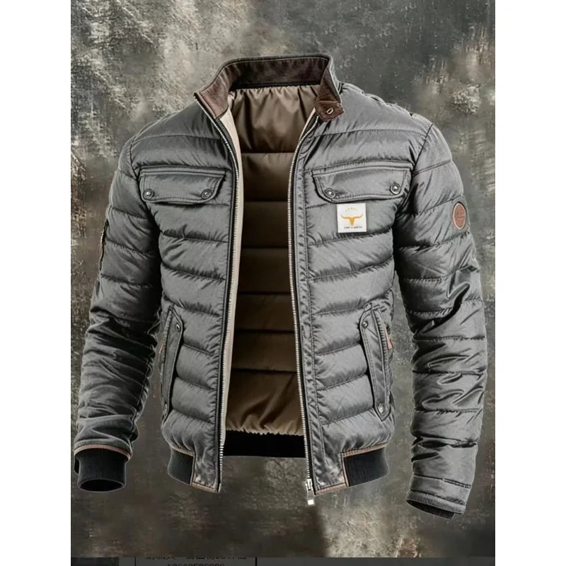 Gray quilted puffer jacket with open front, flap pockets and brown corduroy collar on a textured backdrop 3