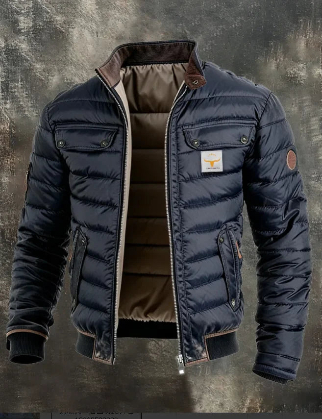 Closer, tighter view of the navy quilted puffer jacket with open zipper and brown collar trim 5