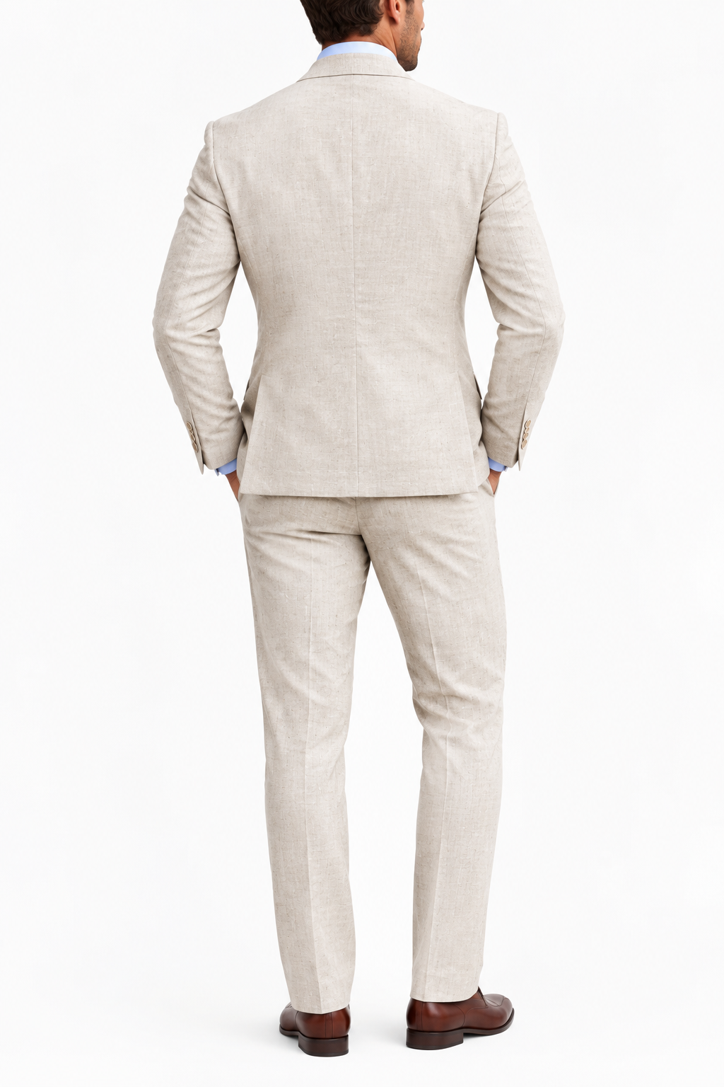 Back view of a beige suit jacket and matching trousers worn with brown leather shoes on white background 7