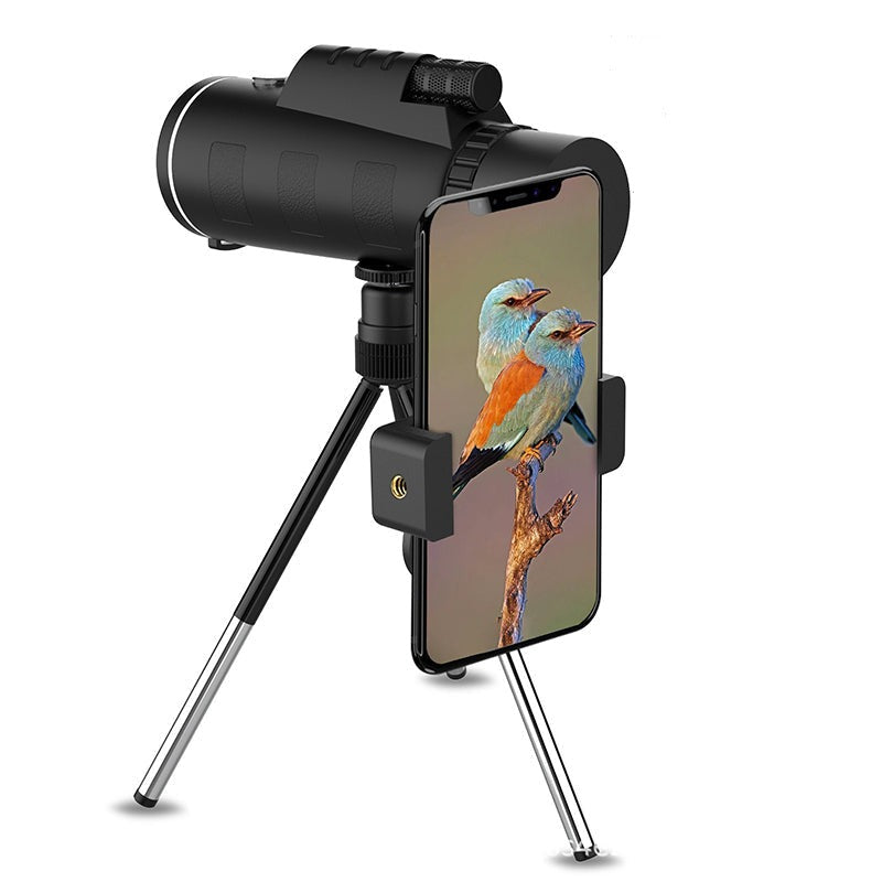 Monocular on a small telescopic tripod with a smartphone clamped to the eyepiece.