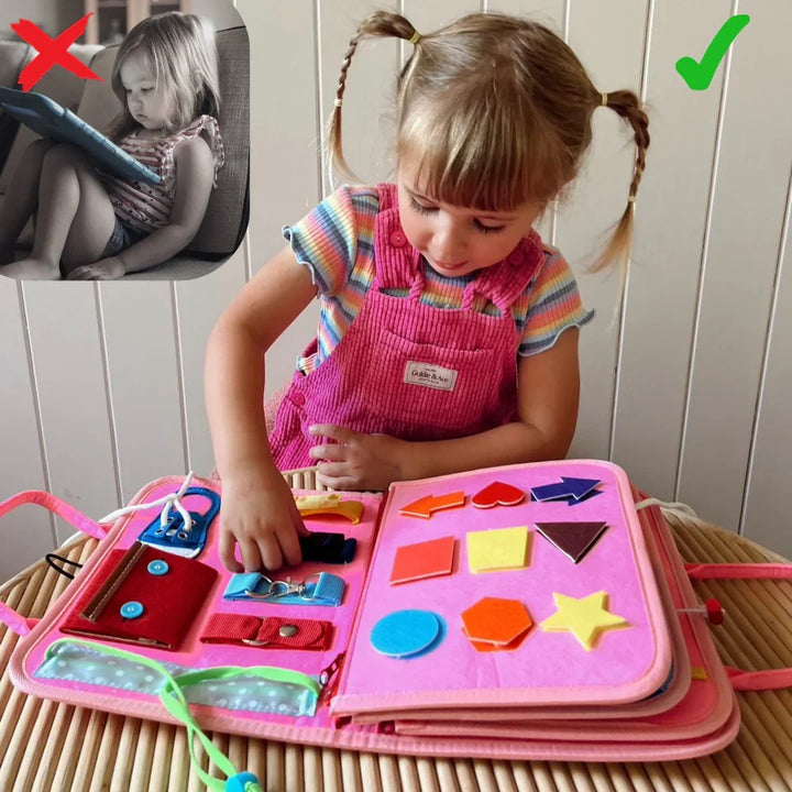 Girl with braided pigtails in pink overalls playing with the open pink felt book, with a small inset of a child using a tablet. 4