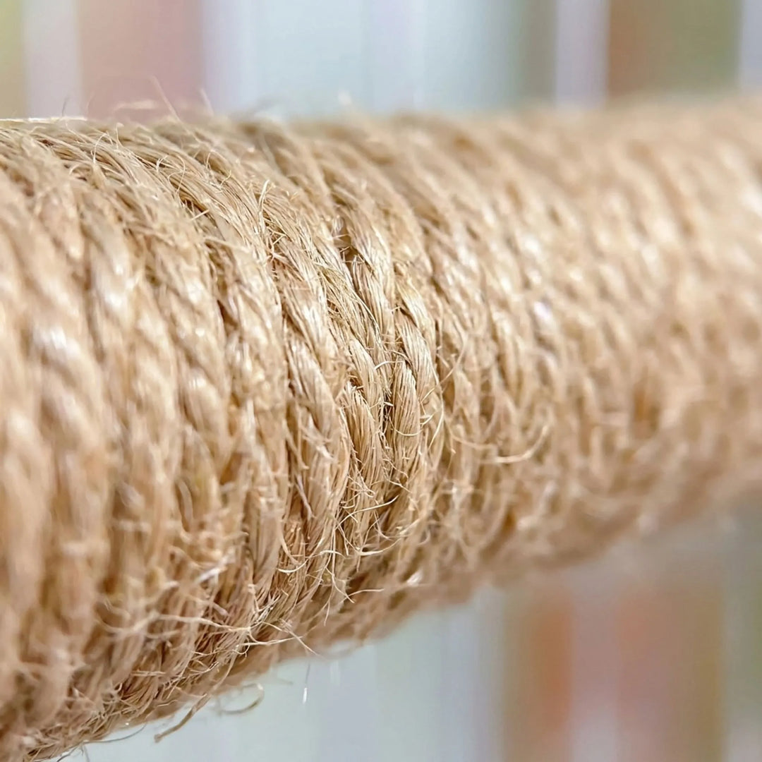 Close-up of the tightly wound natural fiber rope covering the perch, showing its twisted strands and fuzzy texture against a blurred background. 3