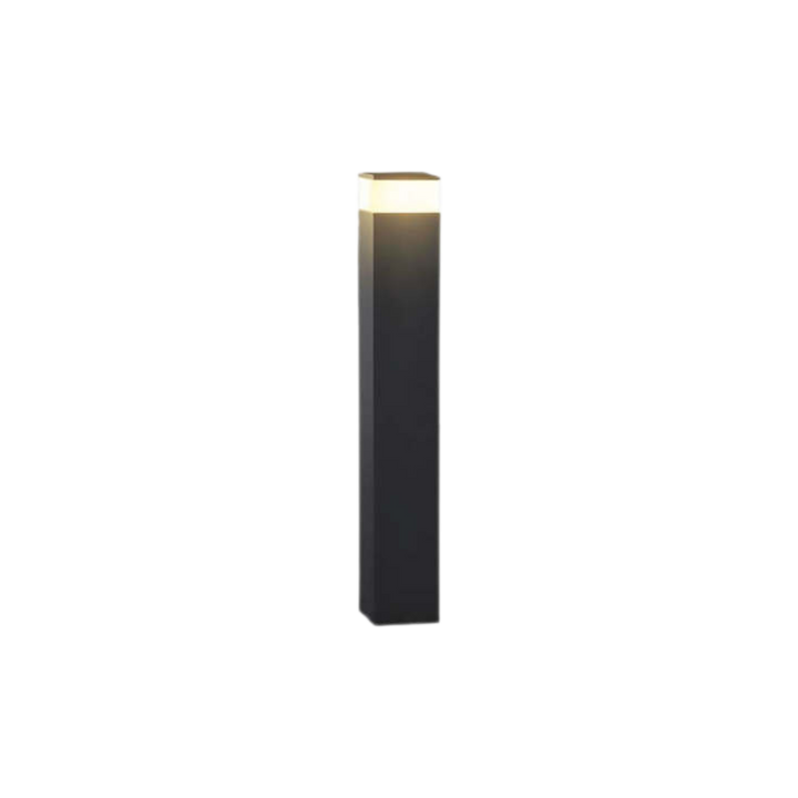 Taller black rectangular bollard light with a glowing warm white band at the top, on white 2