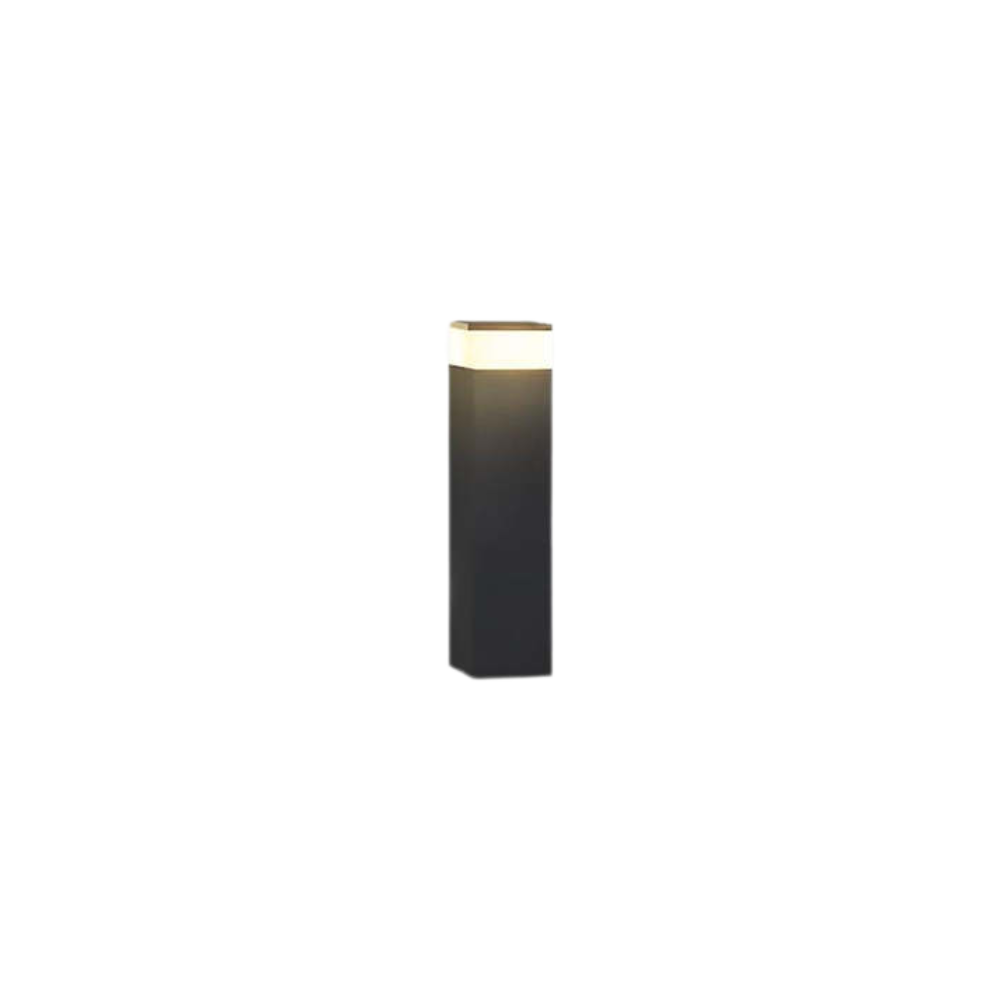 Shorter black rectangular bollard light glowing warm white at the top, shown on a plain white background 1
