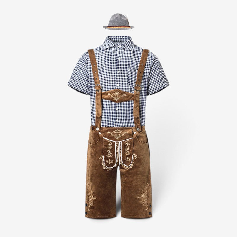 Men's Bavarian costume set with brown lederhosen, a navy checked shirt and a gray feathered hat, flat lay.