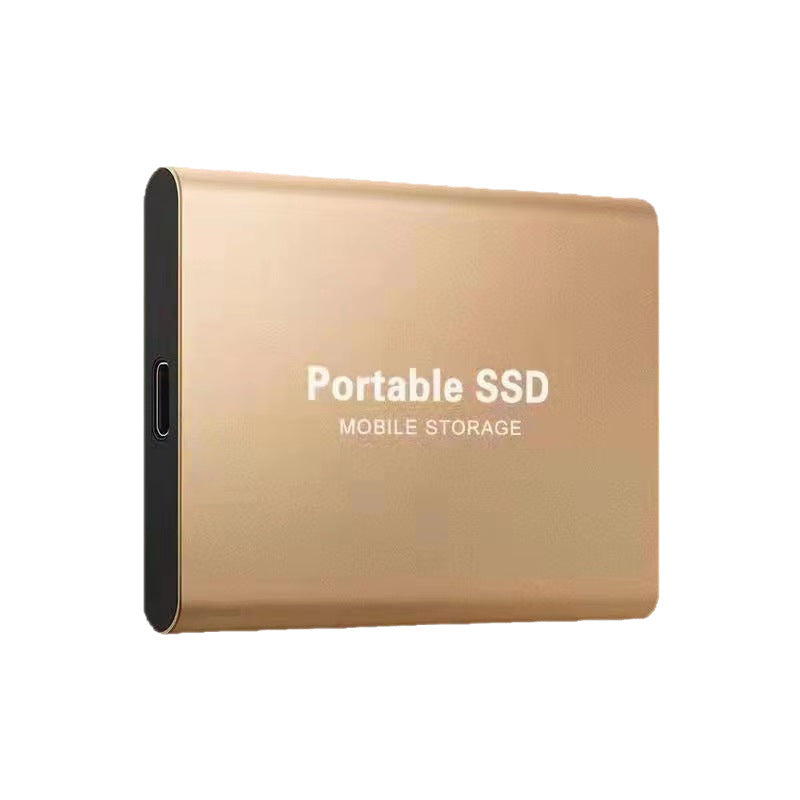 Gold portable SSD with a matte metal finish and USB-C port on its short edge.