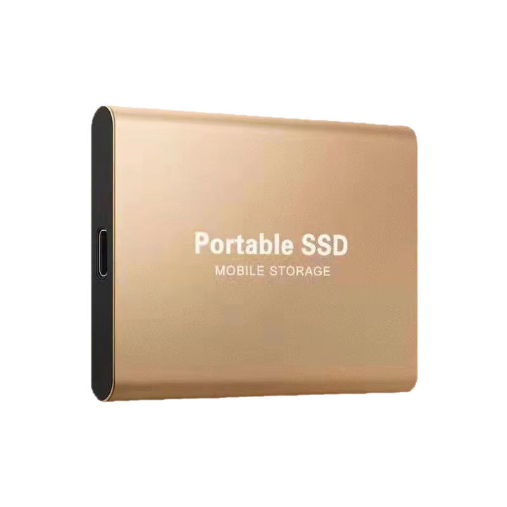 Gold portable SSD with a matte metal finish and USB-C port on its short edge.