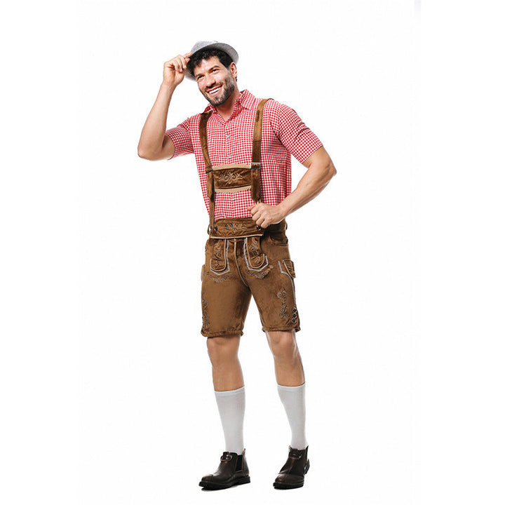 Men's Bavarian costume set with brown lederhosen, a red checked shirt and a gray hat on a model.