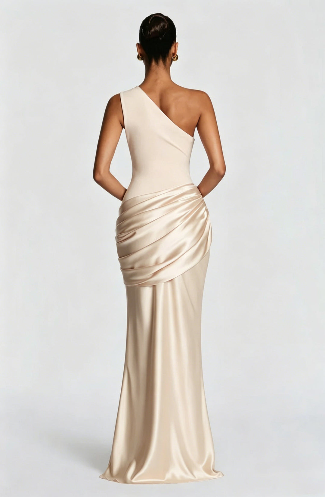 Back view of the cream one-shoulder maxi dress, showing the asymmetric neckline, plain fitted back and draped satin hip. 29