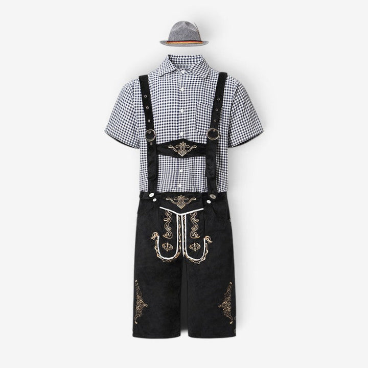 Men's Bavarian costume set with black lederhosen, a black and white checked shirt and a gray hat, flat lay.