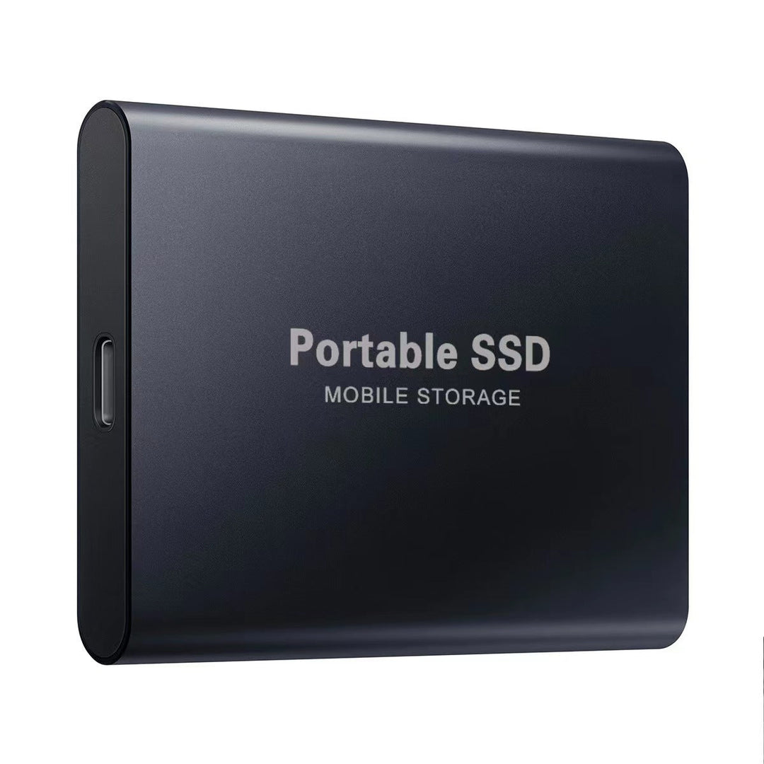 Black portable SSD with a matte metal finish and USB-C port on its short edge.