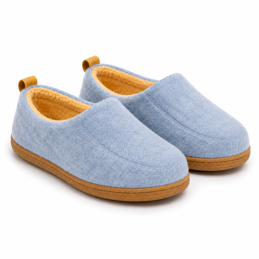 Pair of light blue felt slippers with yellow fleece lining and tan rubber soles, shown at an angle.