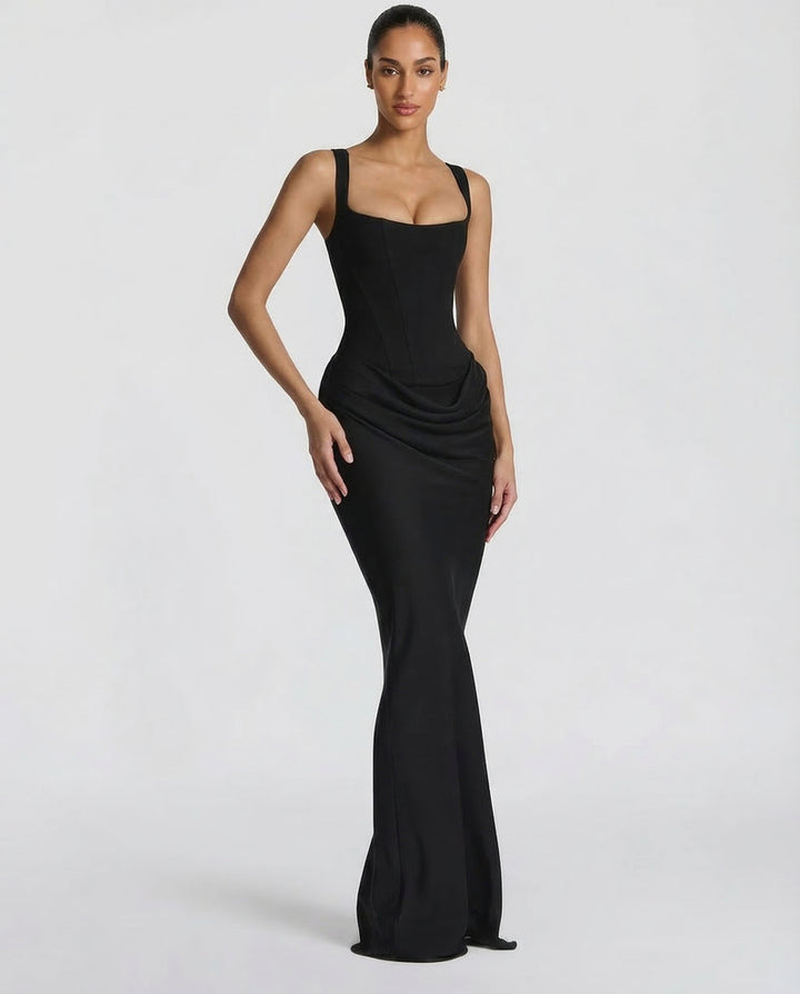 Black maxi dress another view with a fitted skirt and flared hem.