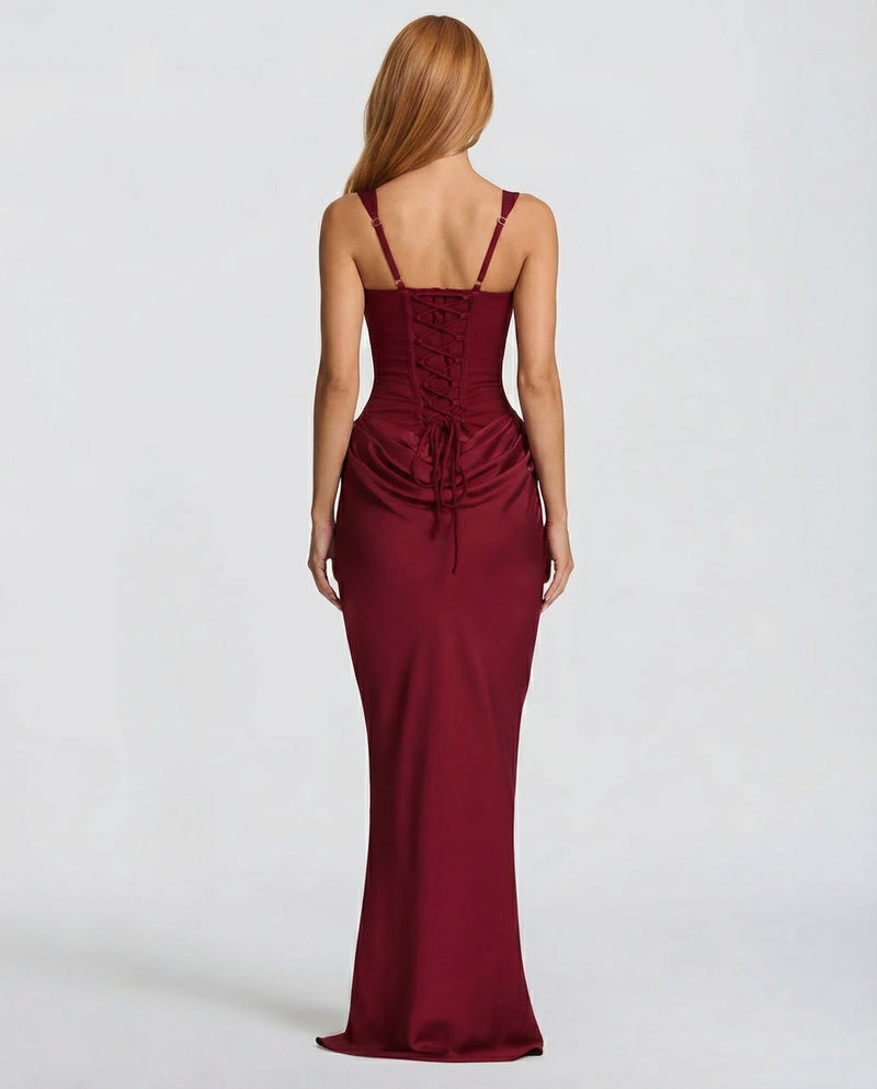 Burgundy maxi dress with a lace-up corset back and adjustable straps, back view.