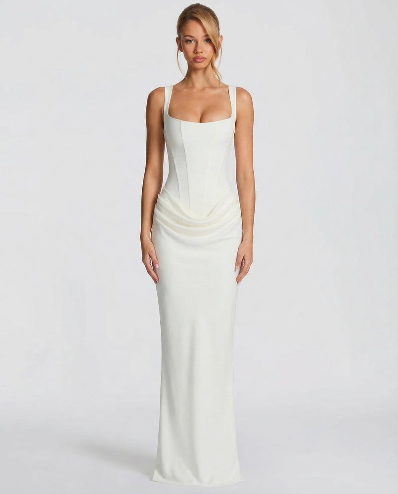 Ivory maxi dress with a square-neck corset bodice and draped hips, front view.