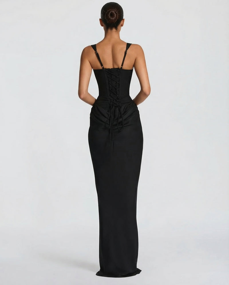 Black maxi dress with a lace-up corset back and adjustable straps, back view.