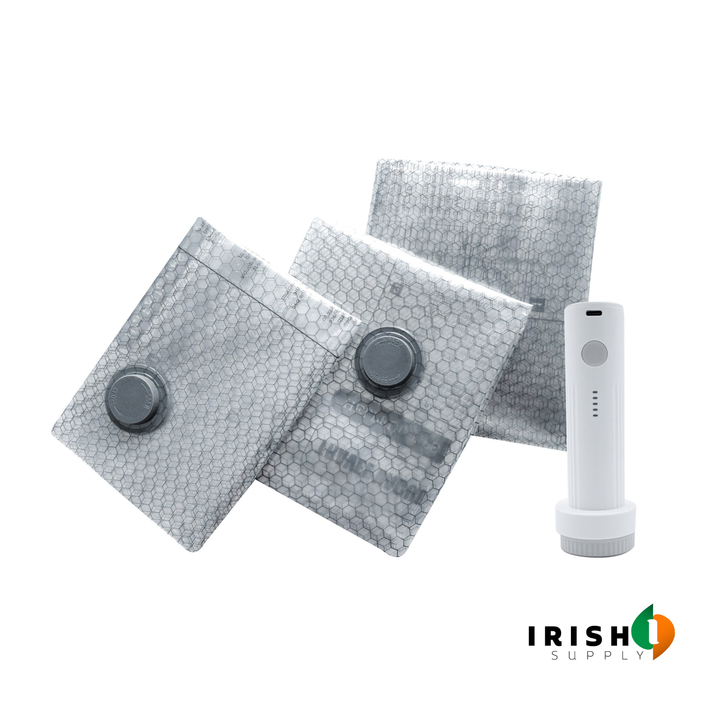 Three clear honeycomb-patterned compression bags with the white pump beside them.
