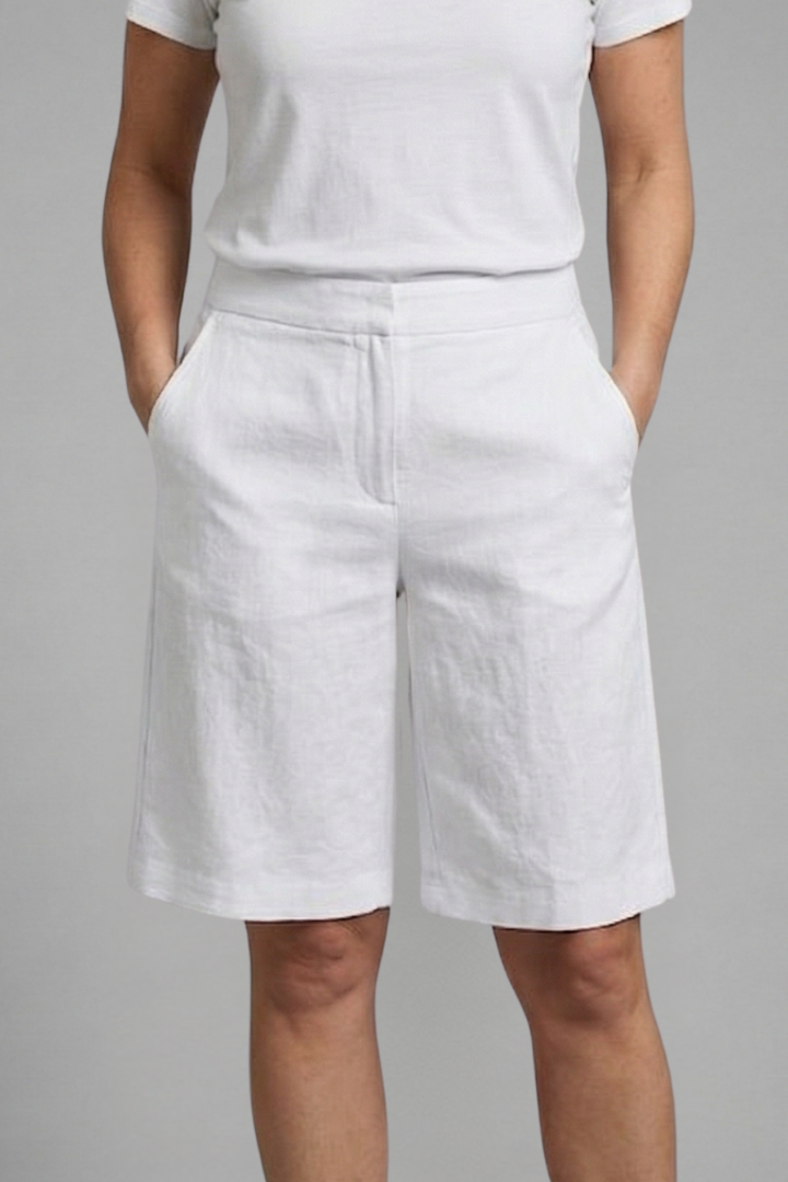 White high-waisted linen shorts, another view.