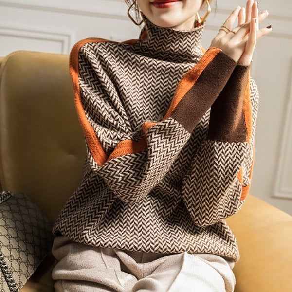 Women's mock neck sweater in brown with orange stripes, another view.