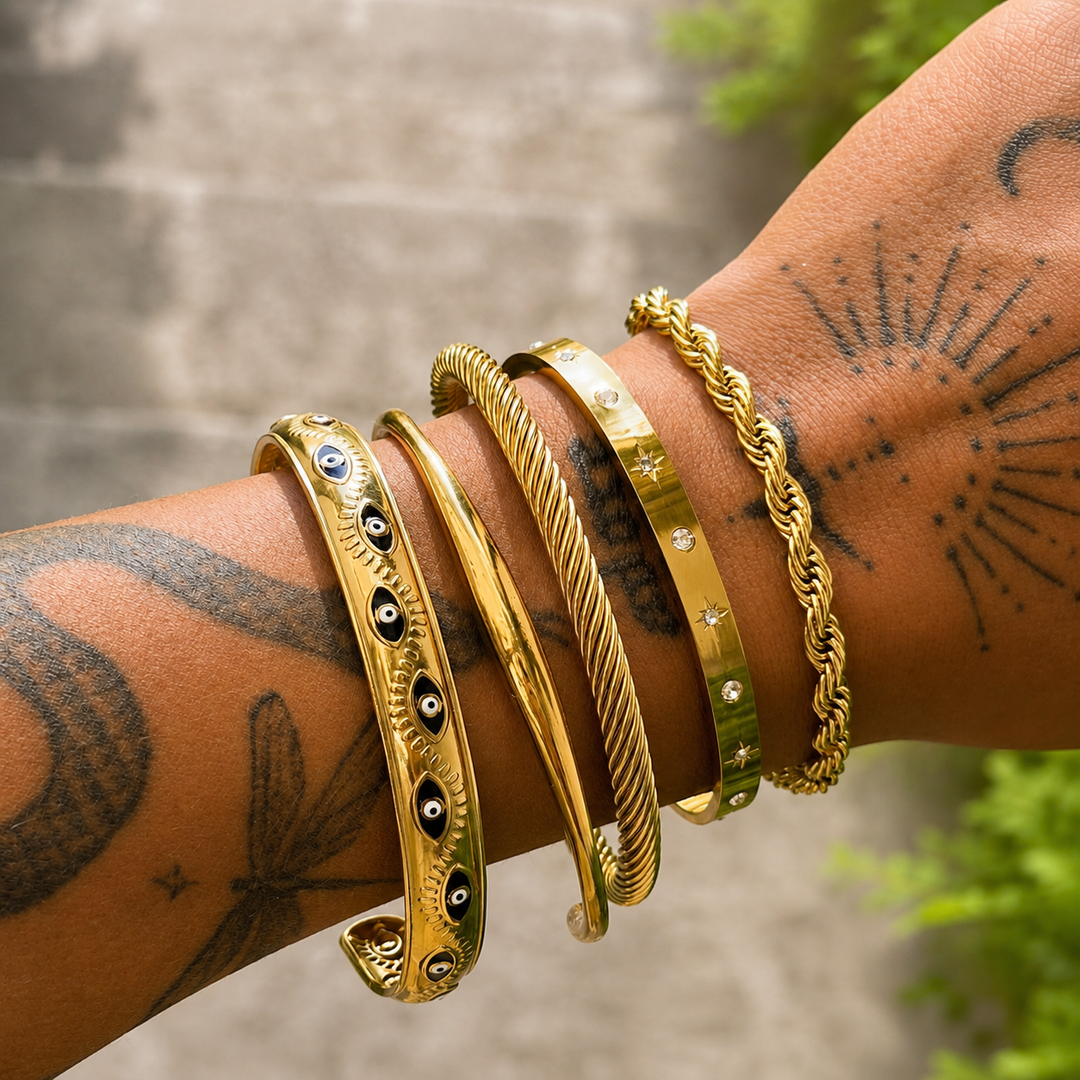 Lysa Gold Bracelet another view worn on a wrist with stacked bracelets
