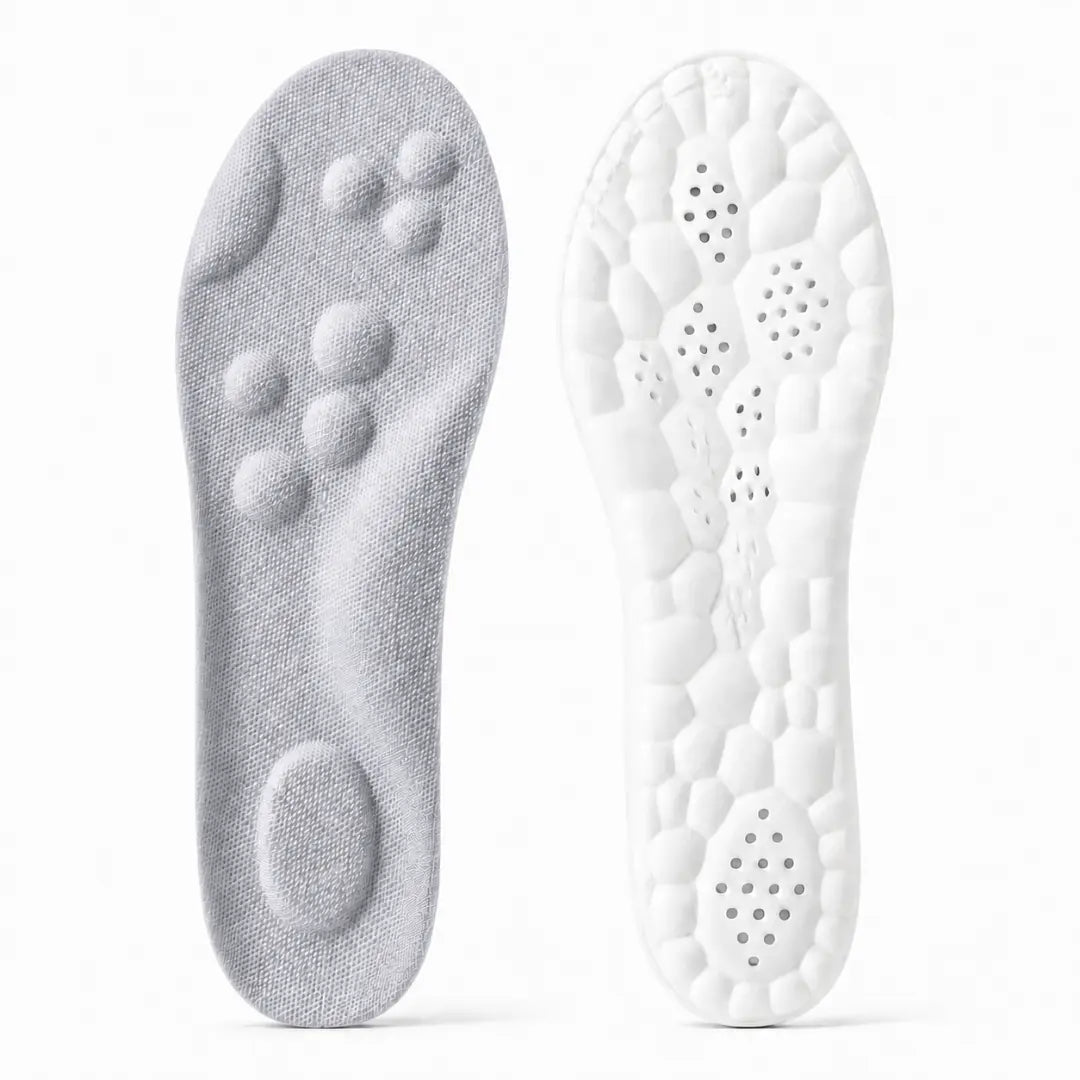 Gray insole top surface with raised massage nodes and a white underside with a honeycomb cushion pattern and small ventilation holes.