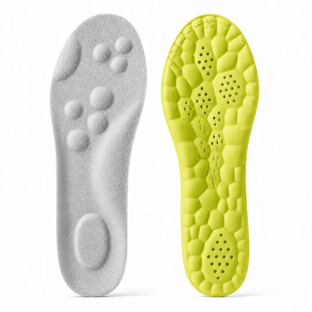 Gray insole top with raised massage nodes and a lime-green underside with a honeycomb cushion pattern and ventilation holes.