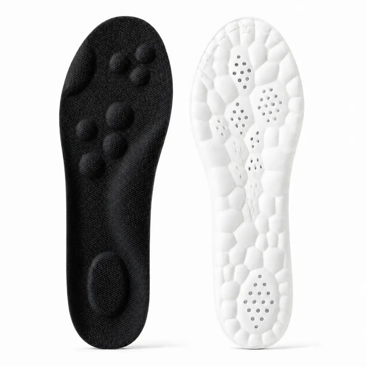 Black insole top with raised massage nodes and a white underside with a honeycomb cushion pattern and ventilation holes.