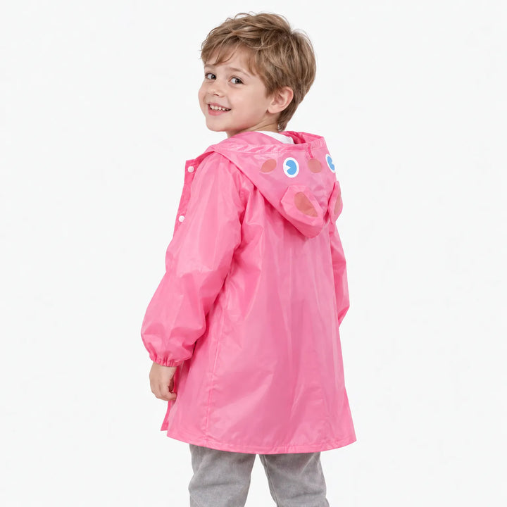 Boy looking back over his shoulder in the pink raincoat, showing the back of the hood with bunny ears. 4