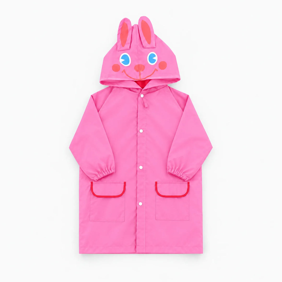 Pink raincoat with a smiling bunny-face hood and upright ears, red-trimmed pockets and snap front, shown flat. 9