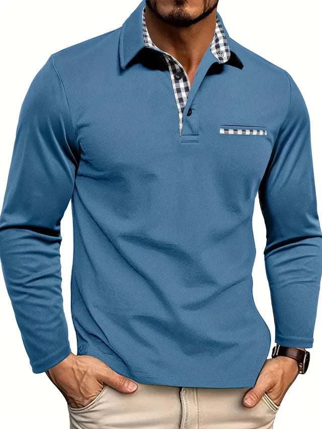 Men's long sleeve polo in blue with black-and-white gingham collar trim and pocket detail, another view.
