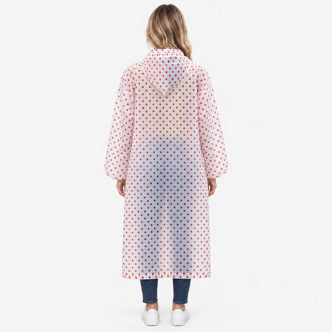 Back view of a woman in a translucent hooded raincoat with red polka dots and gathered, puffed sleeve cuffs. 4