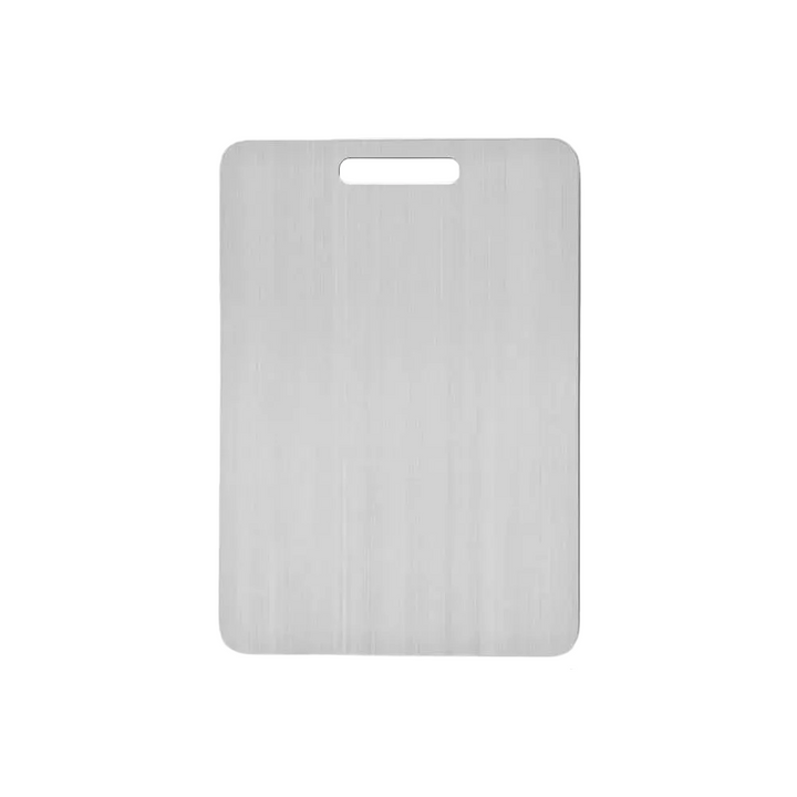 Front view of a rectangular brushed stainless steel cutting board with rounded corners and a finger-hole handle near the top edge, on white. 1