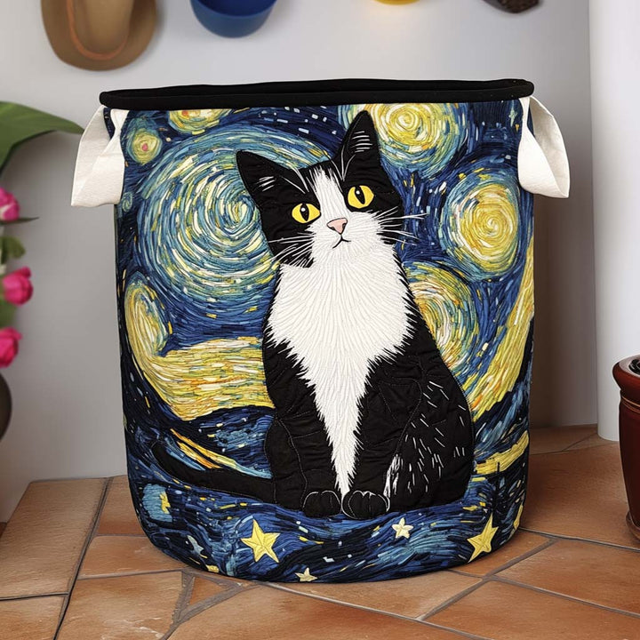 Quilted cat-design laundry basket in black, blue, white, and yellow with canvas handles.