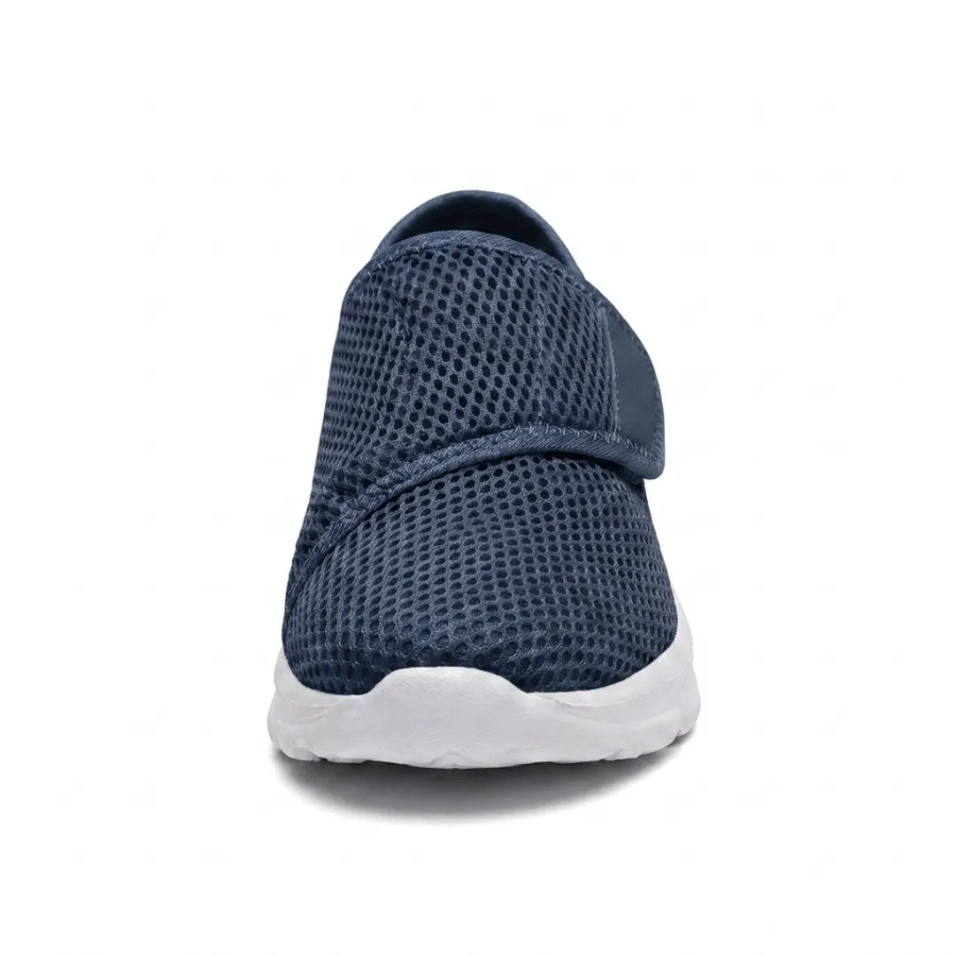 Front view of a navy mesh shoe showing the rounded toe and the strap folded across the instep 8