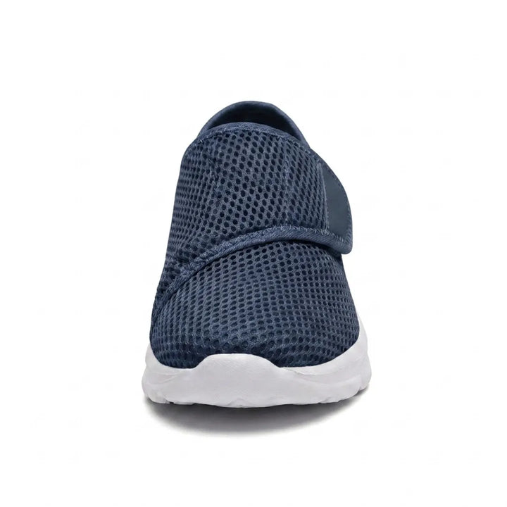 Front view of a navy mesh shoe showing the rounded toe and the strap folded across the instep 8