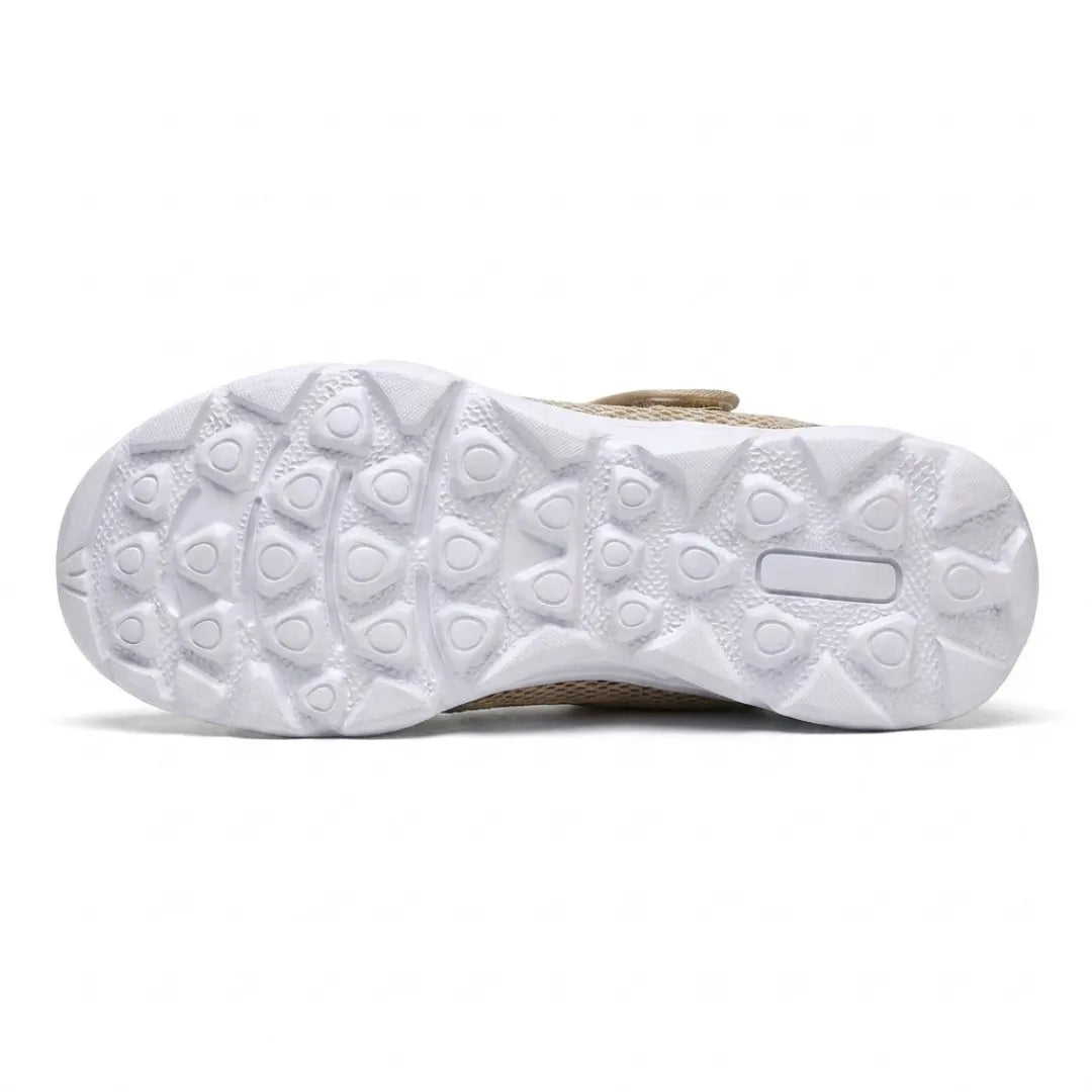 Underside of the white sole on the beige pair, showing the rounded triangular tread pattern 36